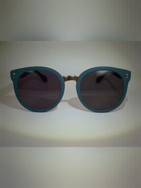 Verdette. Women’s Teal Round Sunglasses with Gold Bridge.